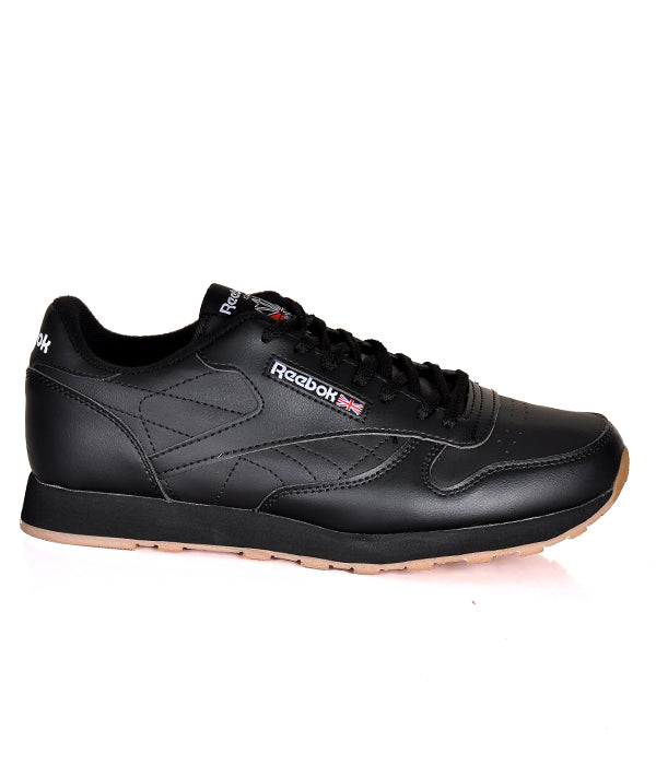 Reebok classic black leather gum best sale sole trainers